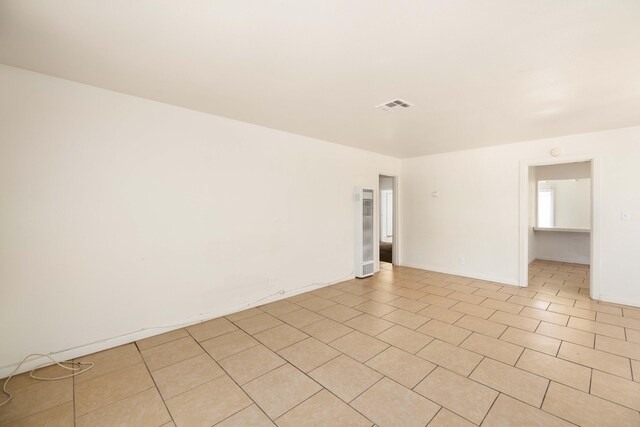 empty room featuring light tile patterned flooring