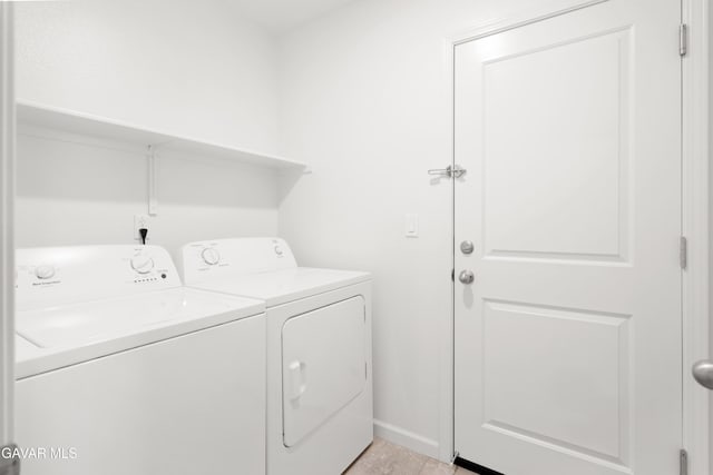 6116 Commonwealth Ave, Bakersfield, CA 93313 - laundry room featuring washing machine and dryer and baseboards