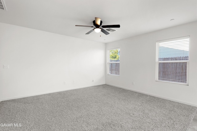 6116 Commonwealth Ave, Bakersfield, CA 93313 - carpeted empty room featuring a ceiling fan and baseboards