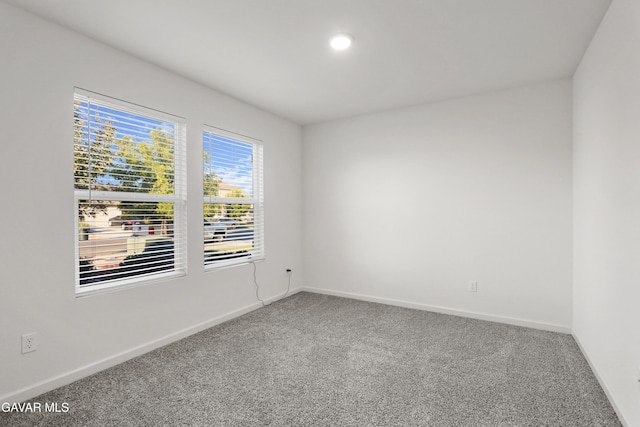 6116 Commonwealth Ave, Bakersfield, CA 93313 - carpeted spare room featuring baseboards and recessed lighting