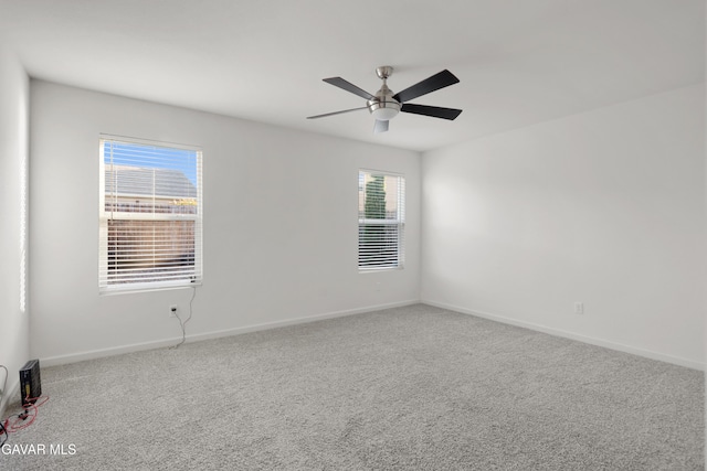 6116 Commonwealth Ave, Bakersfield, CA 93313 - carpeted spare room with a ceiling fan and baseboards