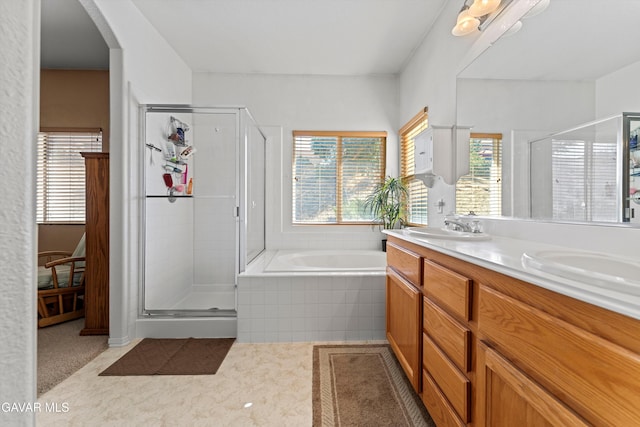 4148 Sungate Dr, Palmdale, CA 93551 - bathroom with double vanity, a bath, and a shower stall