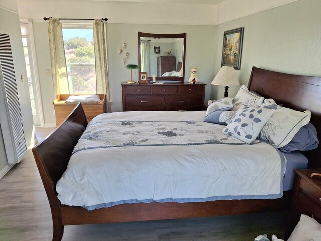 bedroom featuring light hardwood / wood-style floors