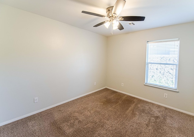 carpeted empty room with ceiling fan