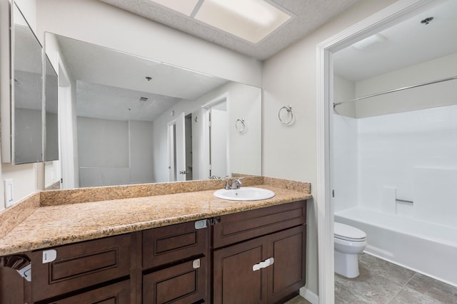 full bathroom with vanity, shower / bathtub combination, and toilet