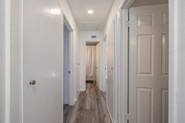 hall featuring wood-type flooring