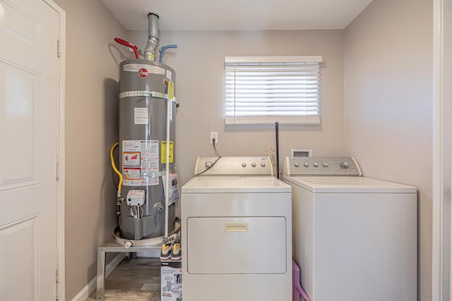 washroom with secured water heater and washer and dryer