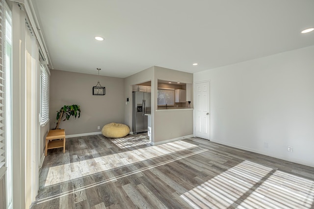 unfurnished room featuring wood-type flooring