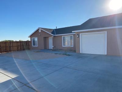 ranch-style house featuring a garage