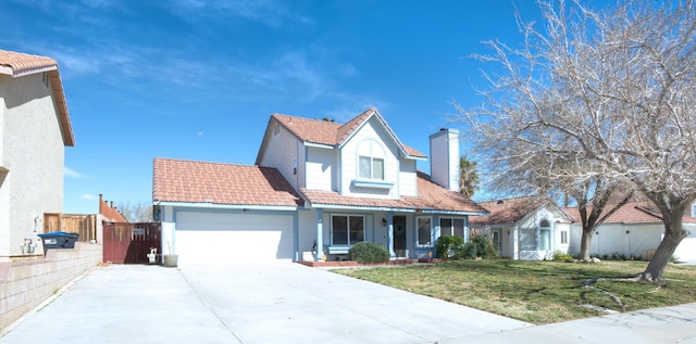 view of front of home featuring a garage, a front yard, fence, and a tiled roof