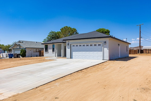 ranch-style house featuring a garage