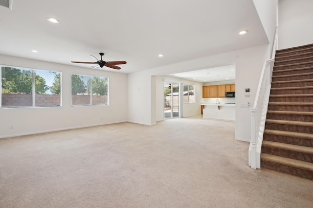 3024 Albret St, Lancaster, CA 93536 - unfurnished living room featuring recessed lighting, ceiling fan, stairway, light carpet, and baseboards