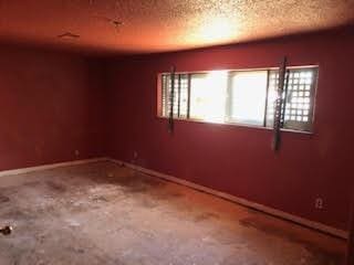 1132 Morven St, Lancaster, CA 93535 - spare room with baseboards