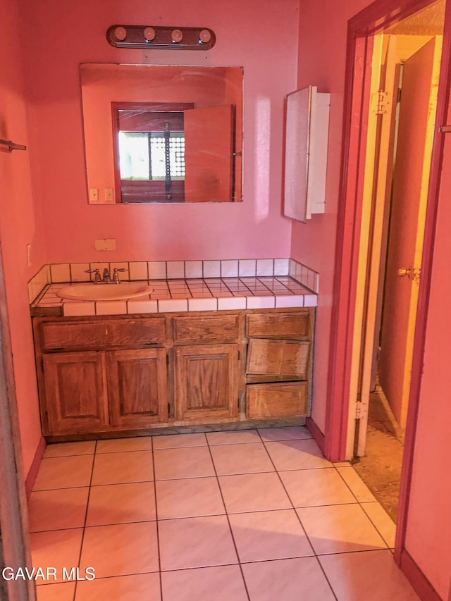 1132 Morven St, Lancaster, CA 93535 - bathroom with tile patterned floors and vanity