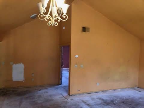 1132 Morven St, Lancaster, CA 93535 - bonus room featuring lofted ceiling, a chandelier, and carpet