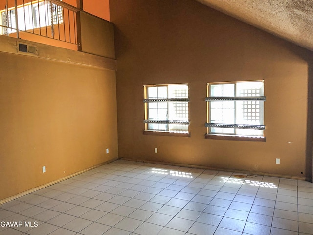 1132 Morven St, Lancaster, CA 93535 - unfurnished room featuring high vaulted ceiling and light tile patterned floors