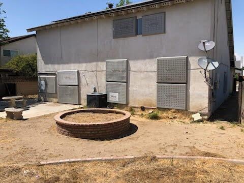 1132 Morven St, Lancaster, CA 93535 - back of property with central AC