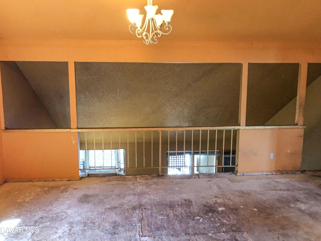 1132 Morven St, Lancaster, CA 93535 - empty room with a chandelier