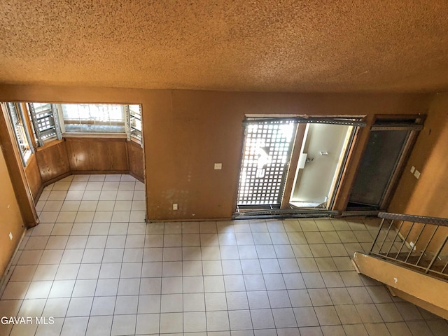1132 Morven St, Lancaster, CA 93535 - spare room featuring a textured ceiling and light tile patterned floors