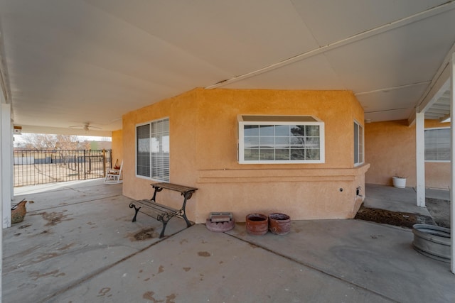 view of patio / terrace featuring fence