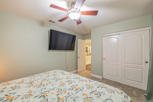 4104 Rainer Pl, Quartz Hill, CA 93536 - bedroom with light carpet, baseboards, a closet, and ceiling fan