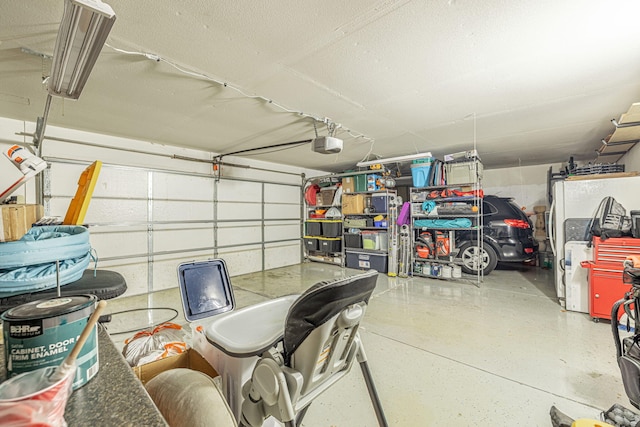 4104 Rainer Pl, Quartz Hill, CA 93536 - garage featuring a garage door opener