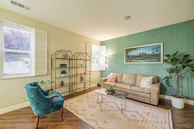 4104 Rainer Pl, Quartz Hill, CA 93536 - sitting room with wood finished floors, baseboards, and healthy amount of natural light