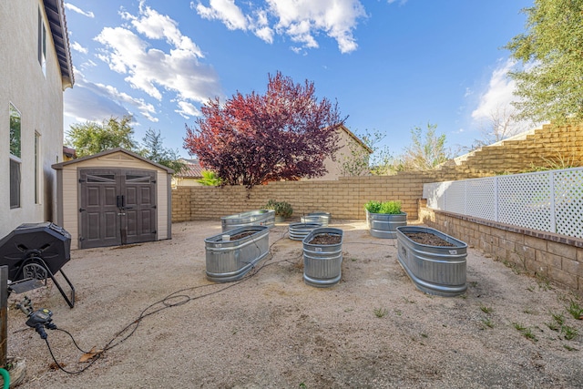 4104 Rainer Pl, Quartz Hill, CA 93536 - fenced backyard featuring a storage shed and an outdoor structure