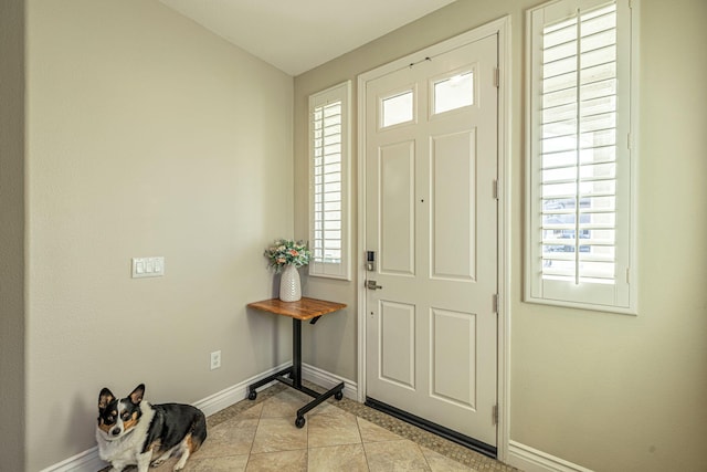 4104 Rainer Pl, Quartz Hill, CA 93536 - entryway featuring baseboards, healthy amount of natural light, and light tile patterned floors