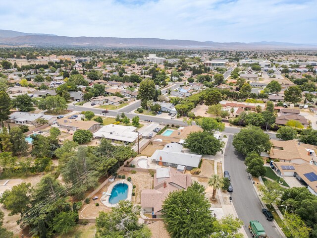 43818 Halcom Ave, Lancaster, CA 93536 - aerial perspective of suburban area featuring a mountainous background and a pool