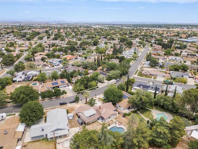 43818 Halcom Ave, Lancaster, CA 93536 - aerial perspective of suburban area with a pool area