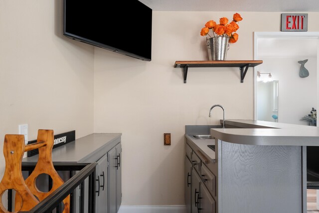 43818 Halcom Ave, Lancaster, CA 93536 - laundry area featuring a sink and baseboards