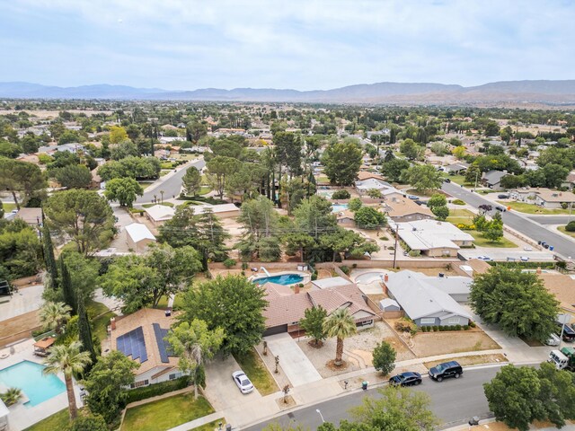 43818 Halcom Ave, Lancaster, CA 93536 - aerial perspective of suburban area featuring a pool and a mountain backdrop
