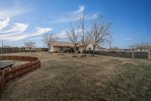 view of yard featuring a fenced backyard