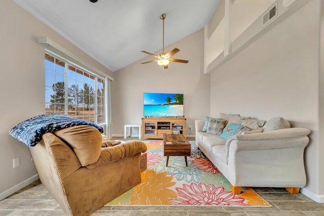 living room featuring visible vents, baseboards, high vaulted ceiling, and ceiling fan