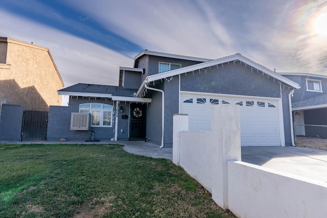 view of front of house with a garage and a yard