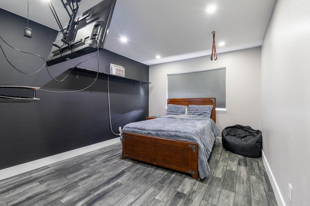 bedroom featuring dark hardwood / wood-style floors