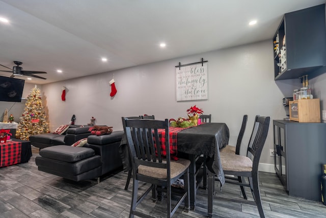 dining room featuring ceiling fan