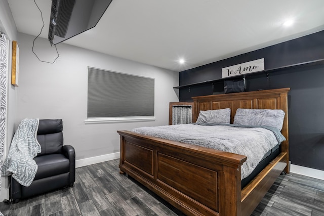 bedroom featuring dark wood-type flooring