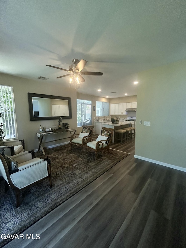 38836 Calistoga St, Palmdale, CA 93551 - living room with dark wood-style floors, ceiling fan, and recessed lighting