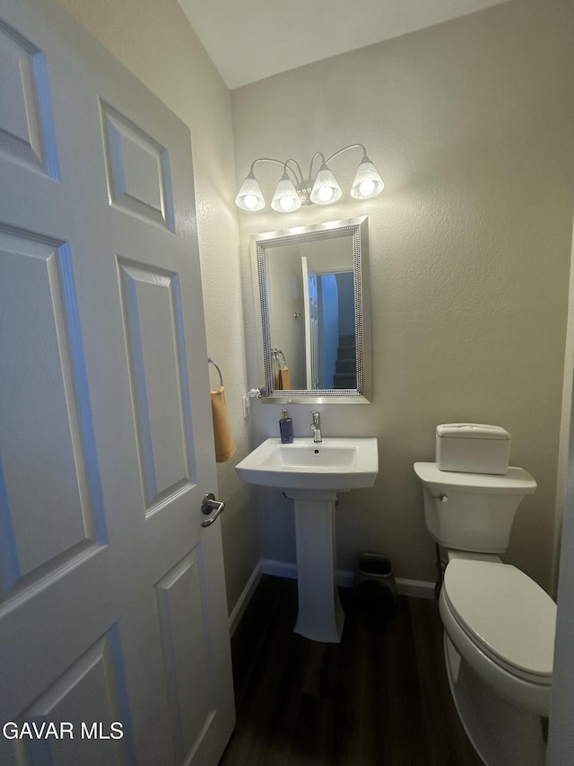 38836 Calistoga St, Palmdale, CA 93551 - bathroom featuring baseboards and wood finished floors