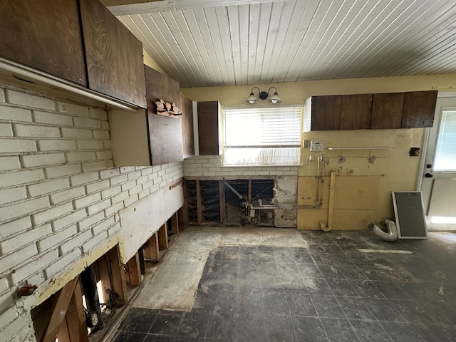 kitchen with dark brown cabinets and wooden ceiling