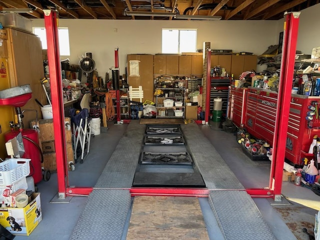 garage with a workshop area