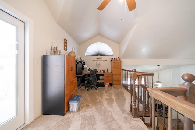 carpeted office featuring ceiling fan and lofted ceiling