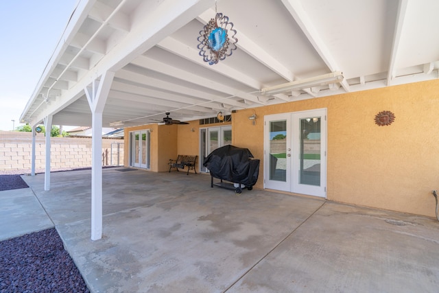 view of patio with french doors and ceiling fan