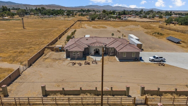 bird's eye view with a mountain view and a rural view