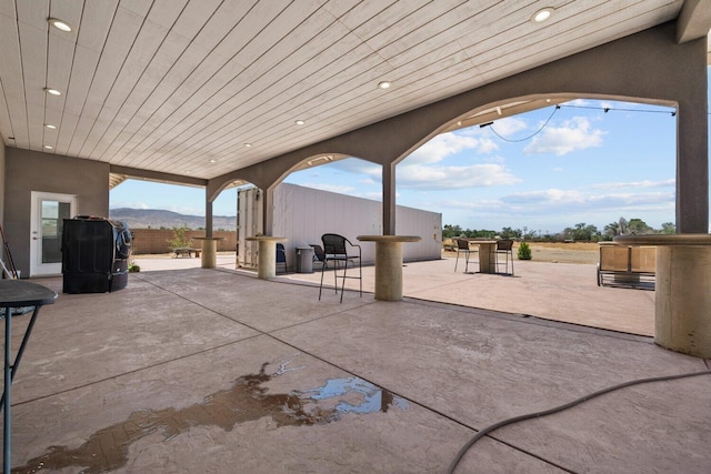 view of patio with a mountain view