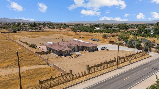 aerial view with a mountain view and a rural view