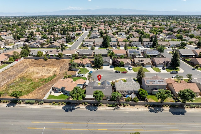 aerial view of residential area with a mountain backdrop