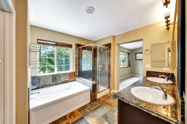 27735 Summer Grove Pl, Valencia, CA 91354 - full bath featuring a bath, a stall shower, healthy amount of natural light, and double vanity